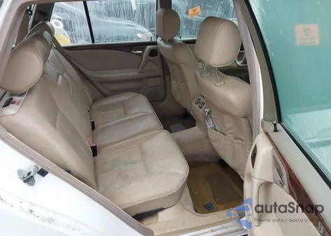 1999 Mercedes-Benz E 320 Awd z USA, uszkodzony, nr VIN WDBJH82F7XX025734